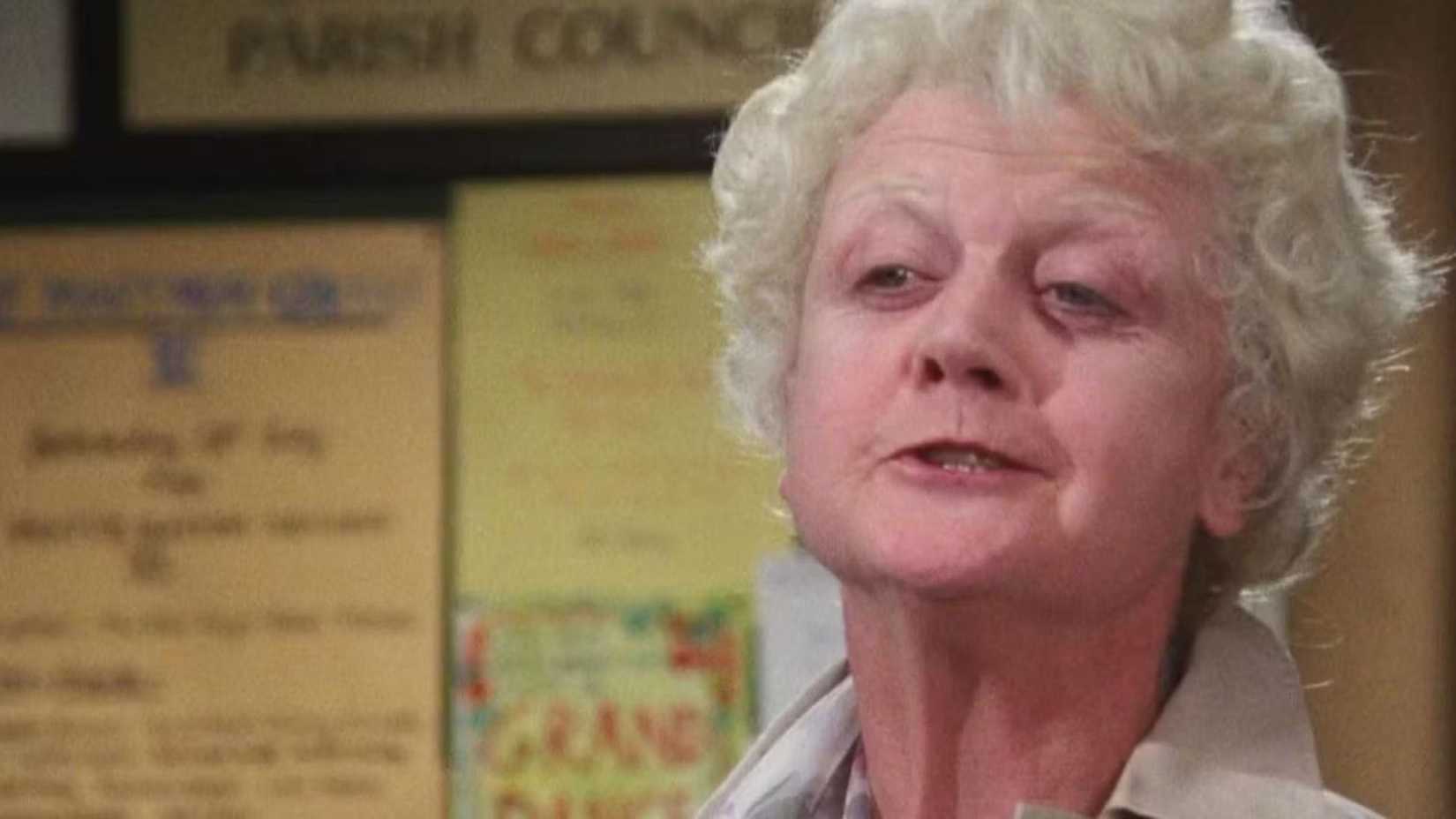 Angela Lansbury as Miss Marple talking to someone off screen