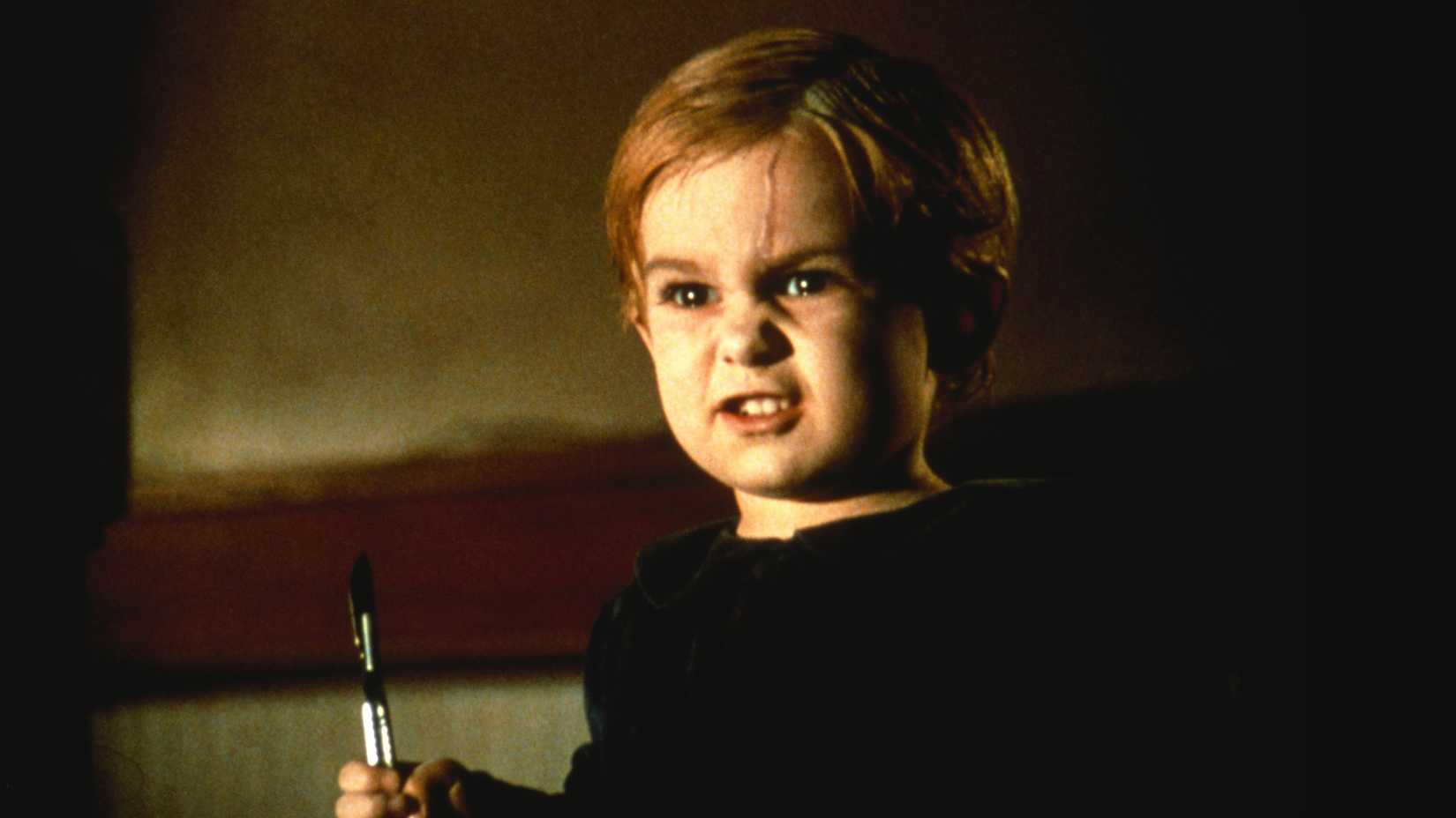 Angry Gage holding a surgical knife in Pet Sematary. 1989