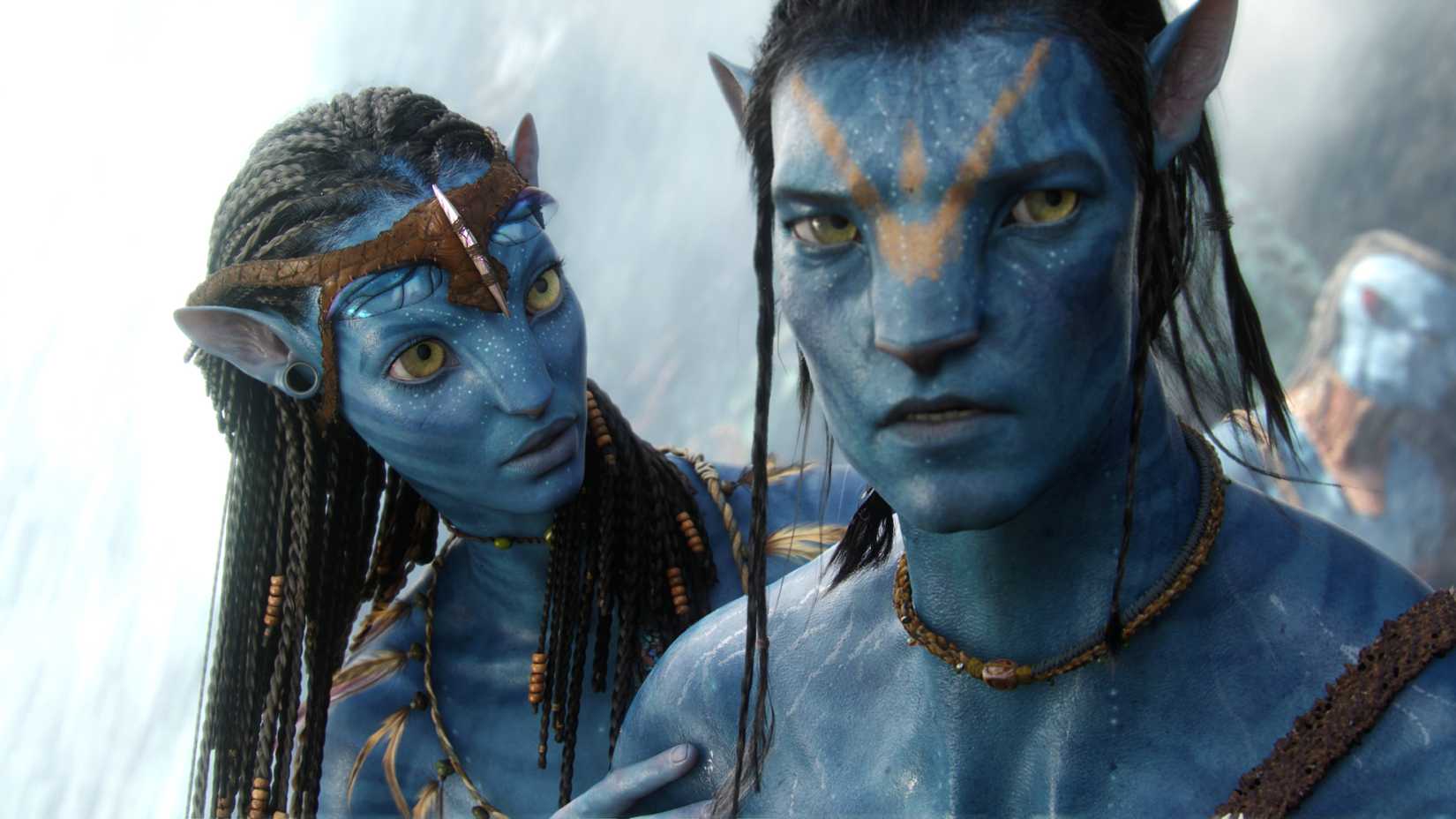 Zoe Saldaña como Neytiri e Sam Worthington como Jake Sully em Avatar.