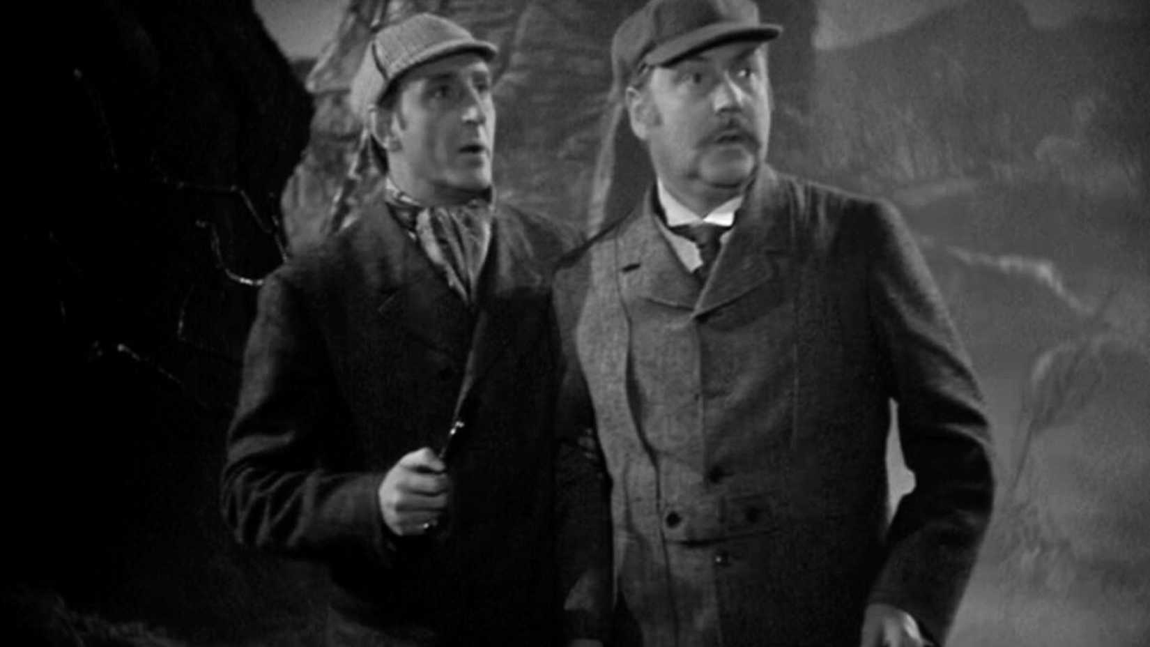 Basil Rathbone e Nigel Bruce como Holmes e Watson em O Cão dos Baskervilles