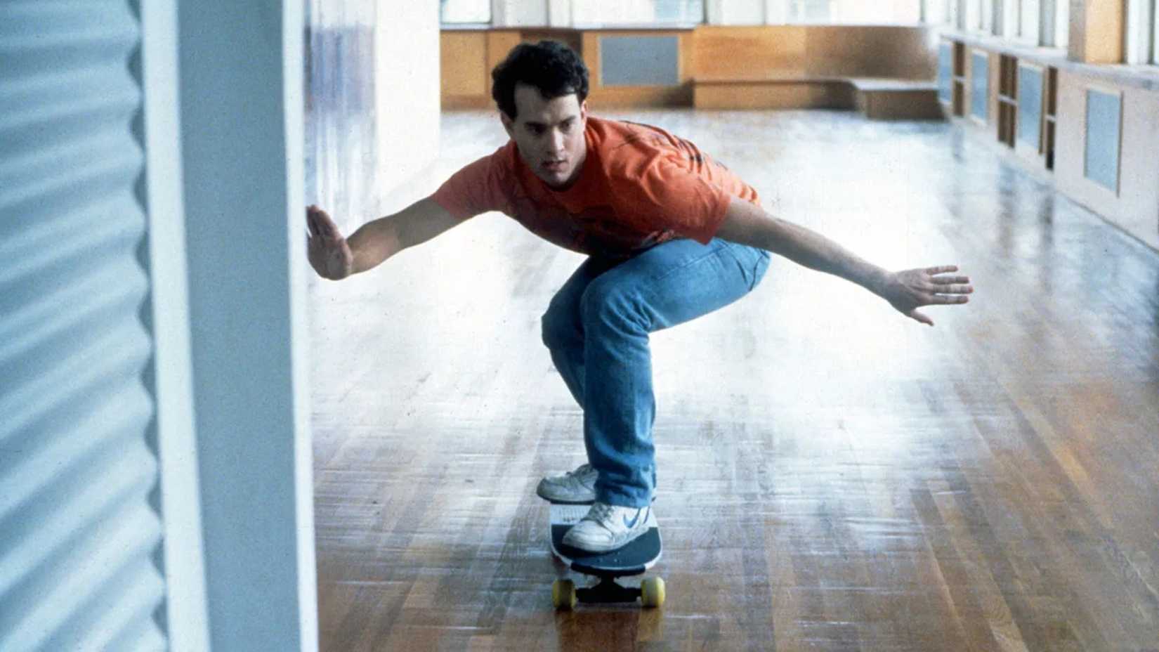 Tom Hanks skateboards in an empty apartment in Big