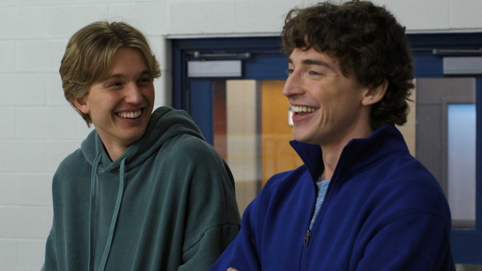 Brayden and Freddie laugh together in Finding Her Edge season 1