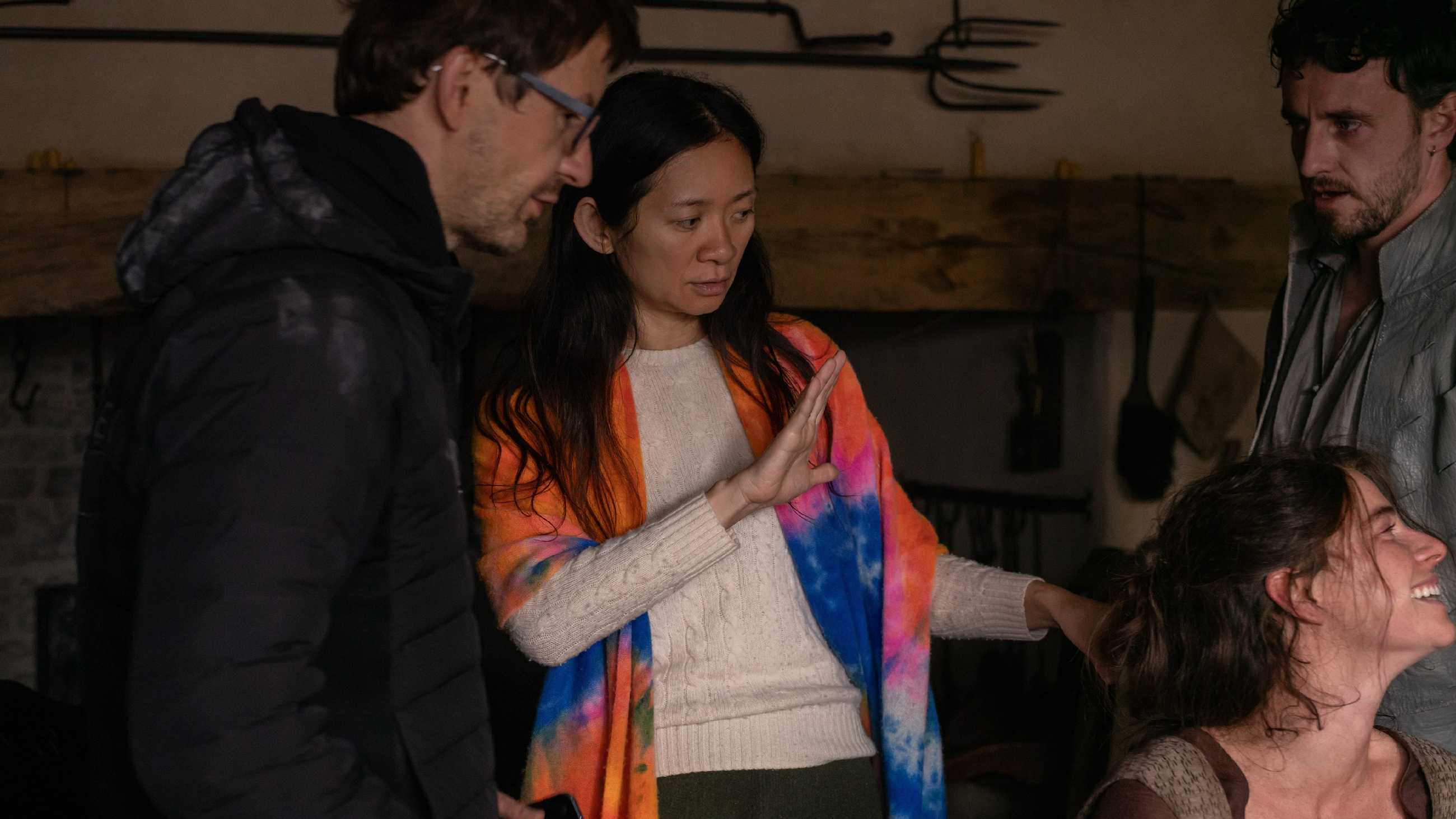 Our Final Predictions For Oscars 2026's Best Director Lineup: Who Will Win? 1 Chloé Zhao on set directing Hamnet