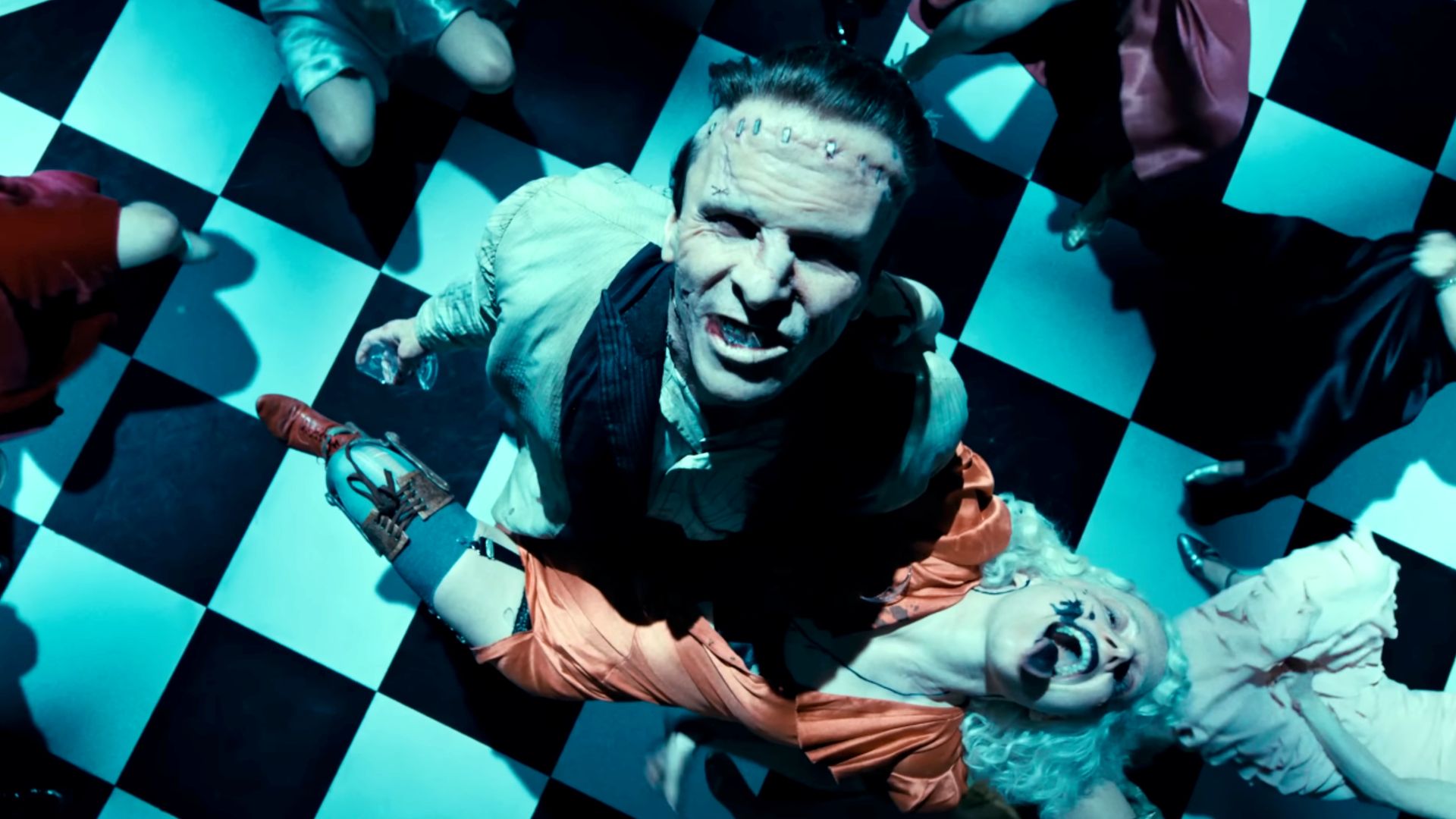 Christian Bale and Jessie Buckley dancing in The Bride