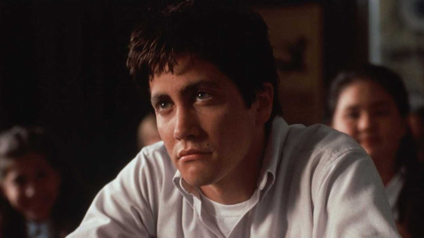 Donnie looks on with a grumpy expression in Donnie Darko
