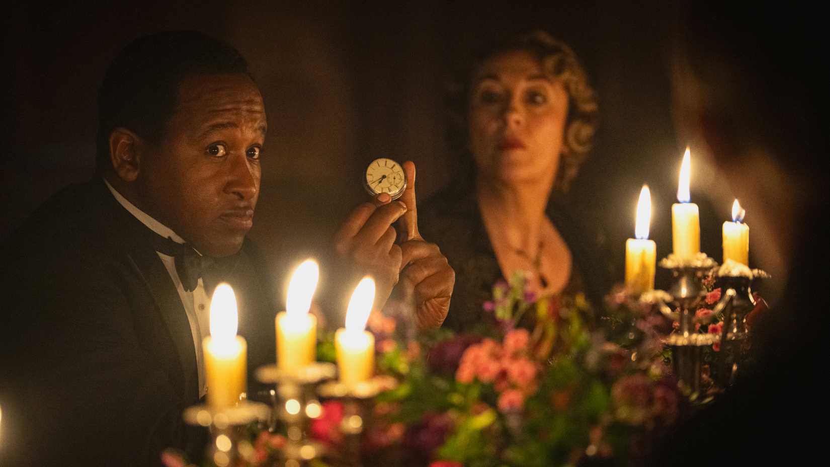 Dr Matip showing his invention next to Lady Coote in Agatha Christie's Seven Dials