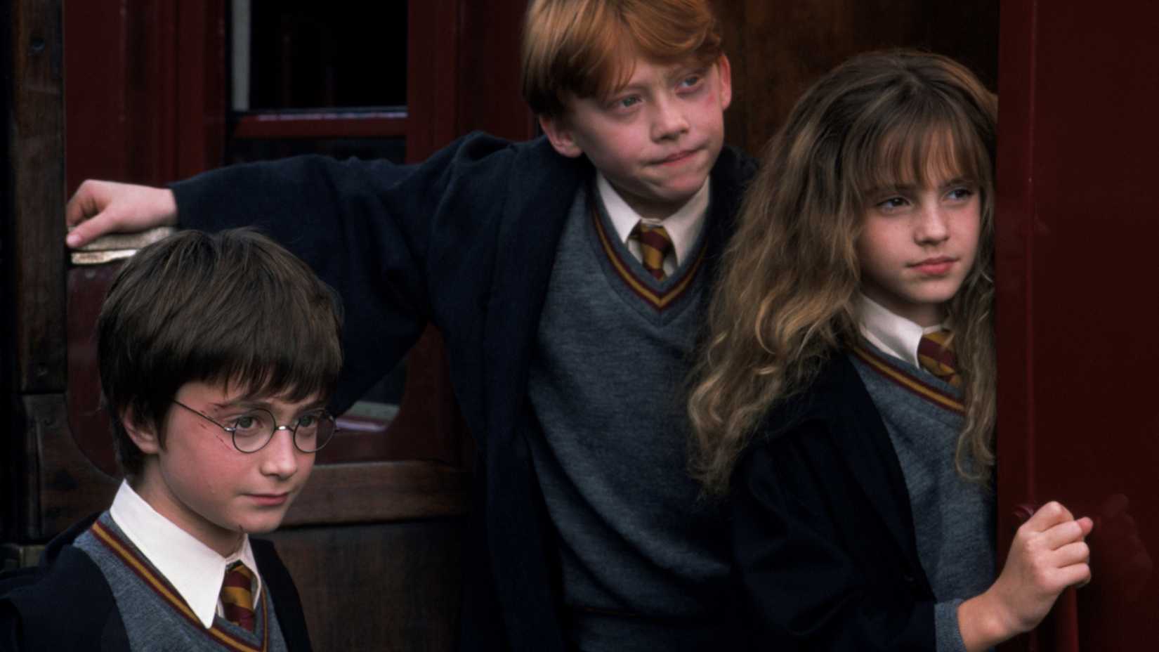 10 Ways Rewatching All 8 Harry Potter Movies In Order Changes How You Look At The Films 1 Harry, Ron, and Hermione in Harry Potter and the Sorcerer's Stone