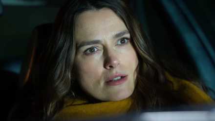 Helen (Keira Knightley) looking shocked in her car in Black Doves season 1