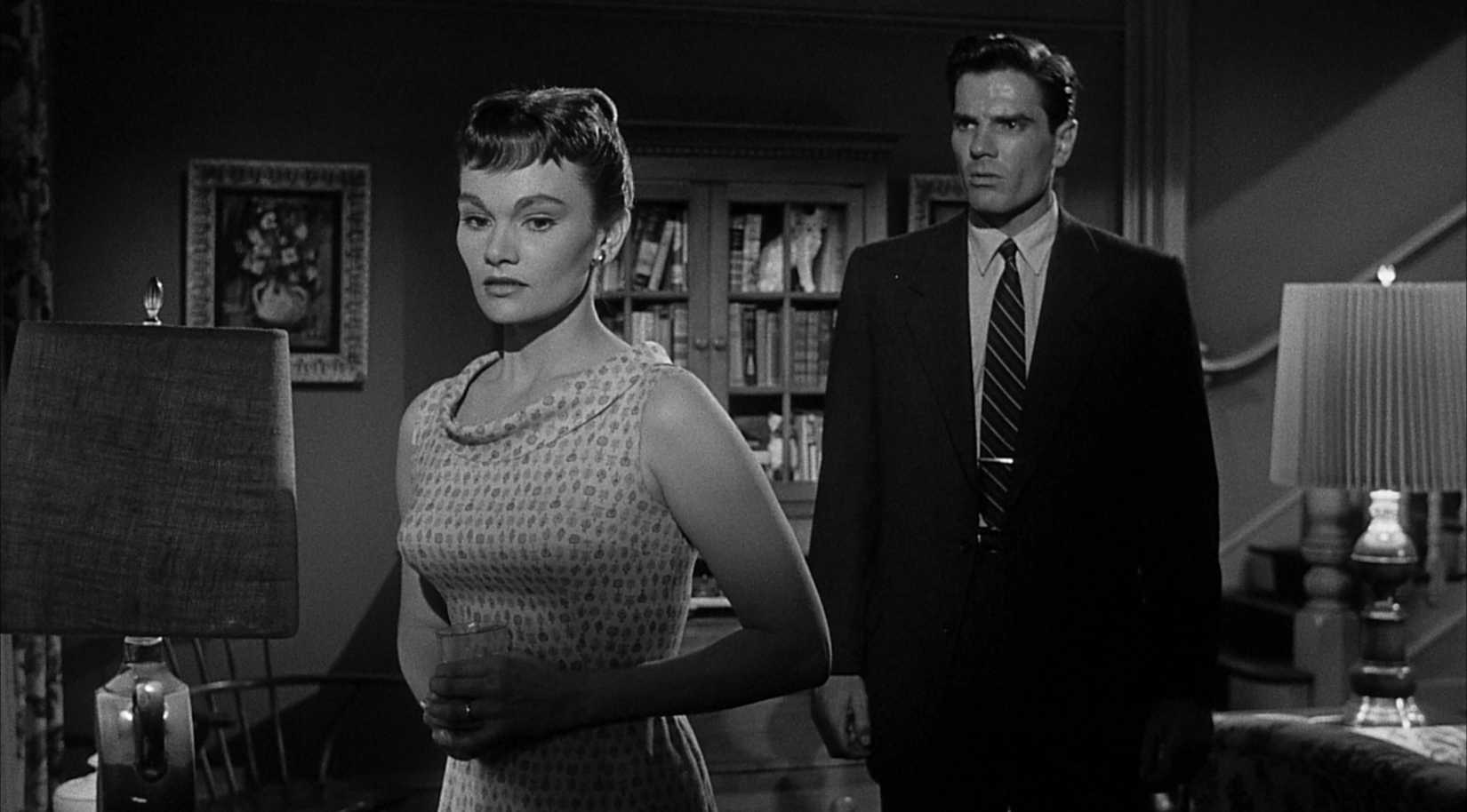Marge talks to her husband in the living room in I Married a Monster from Outer Space