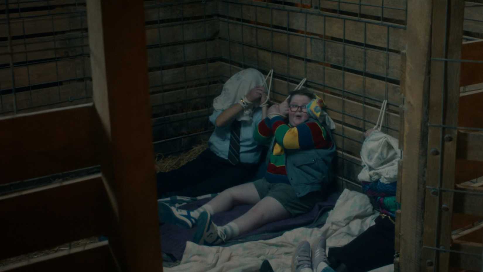 Jake Connelly as Derek and his family tied up in the barn.