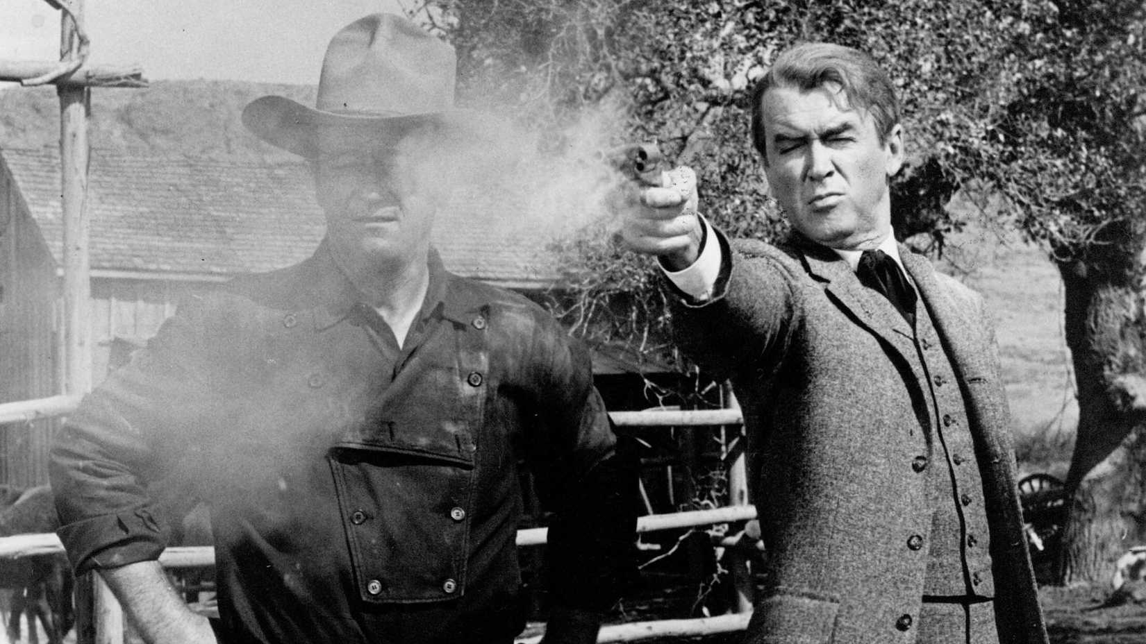 10 Old-School Westerns That Hold Up Well In The 21st Century 2 John Wayne as Tom teaching James Stewart as Rance to shoot in The Man Who Shot Liberty Valance