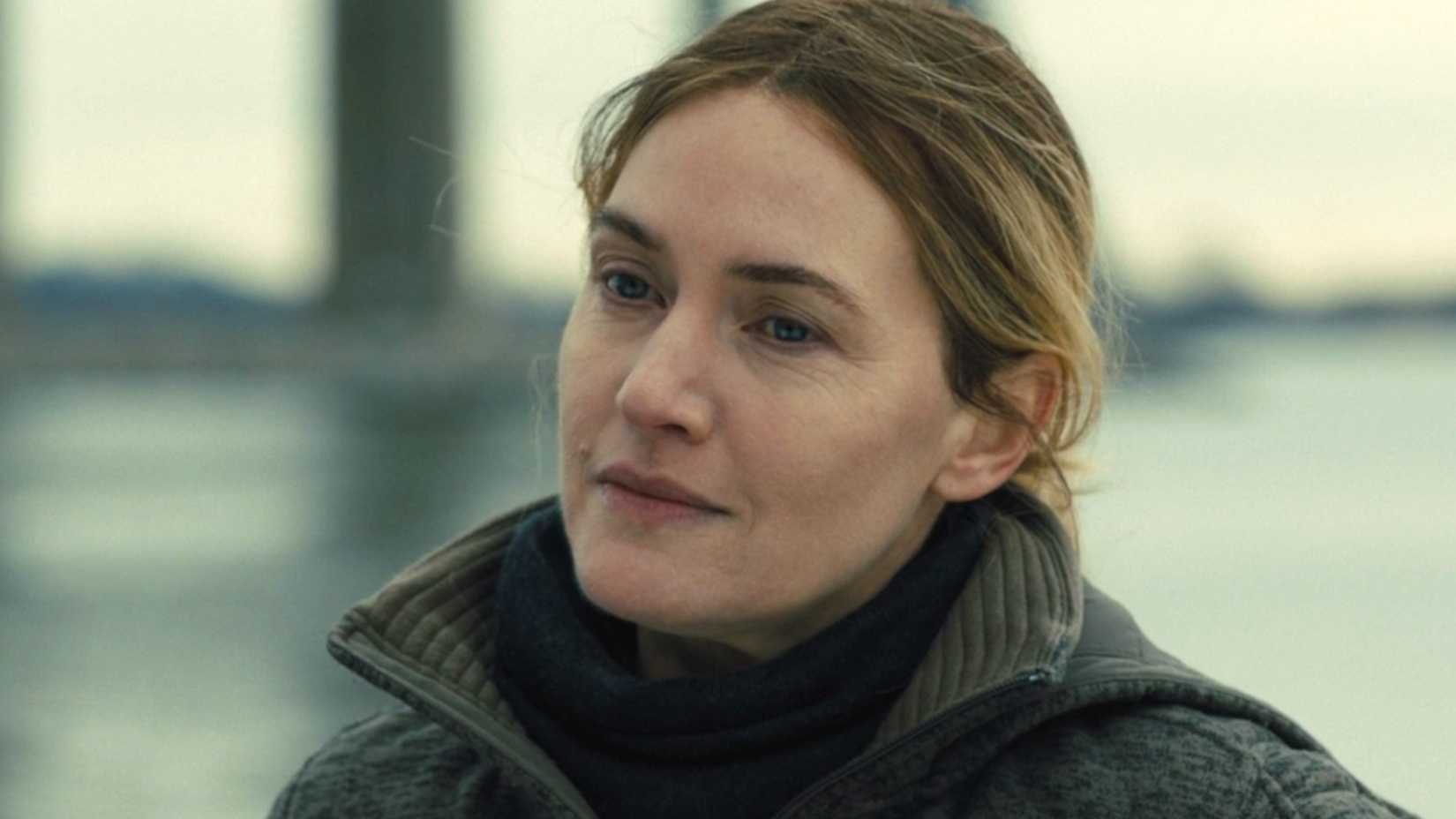 Kate Winslet smiling in Mare of Easttown