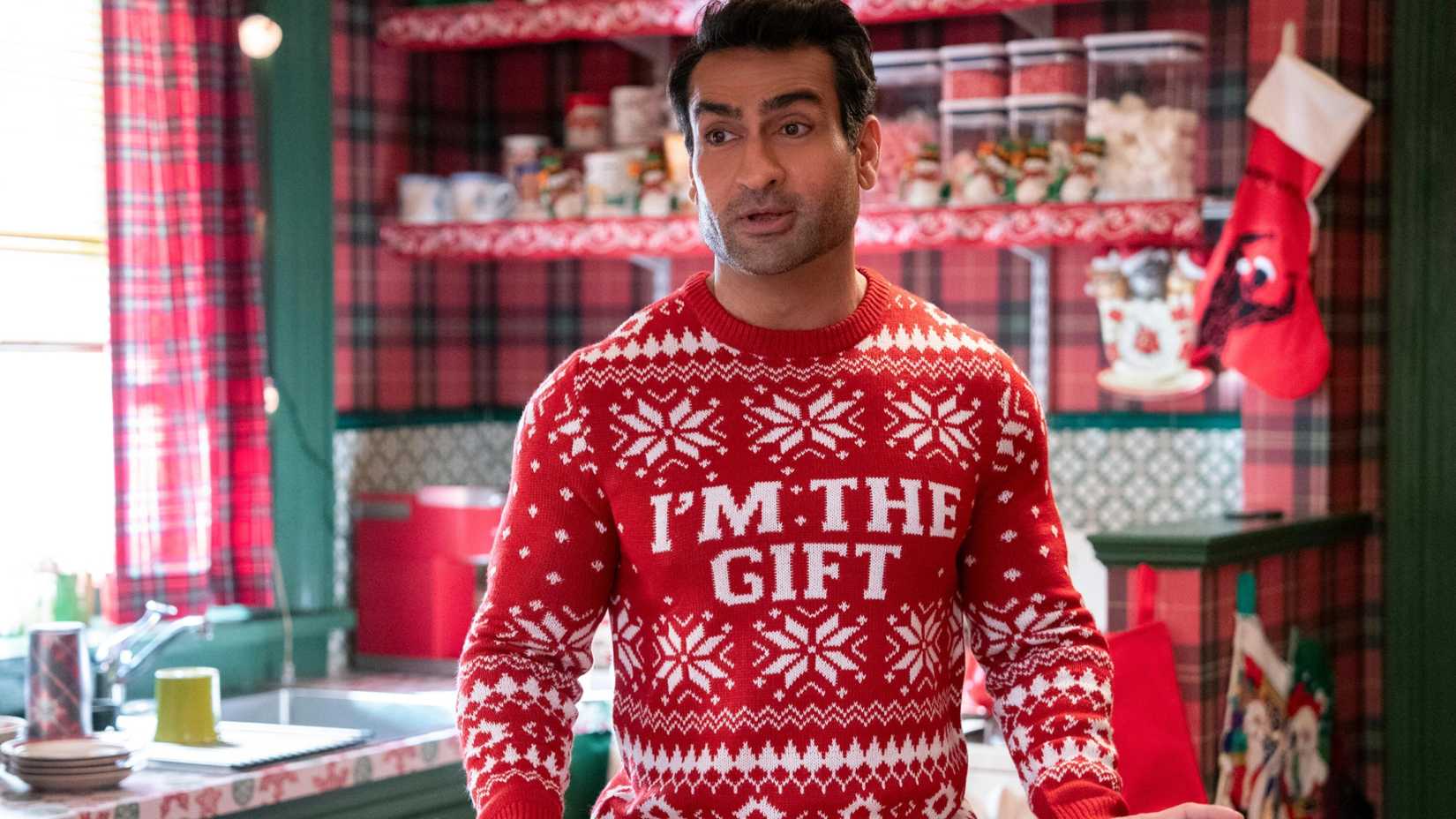 Kumail Nanjiani in an ugly Christmas sweater in Only Murders in the Building season 4