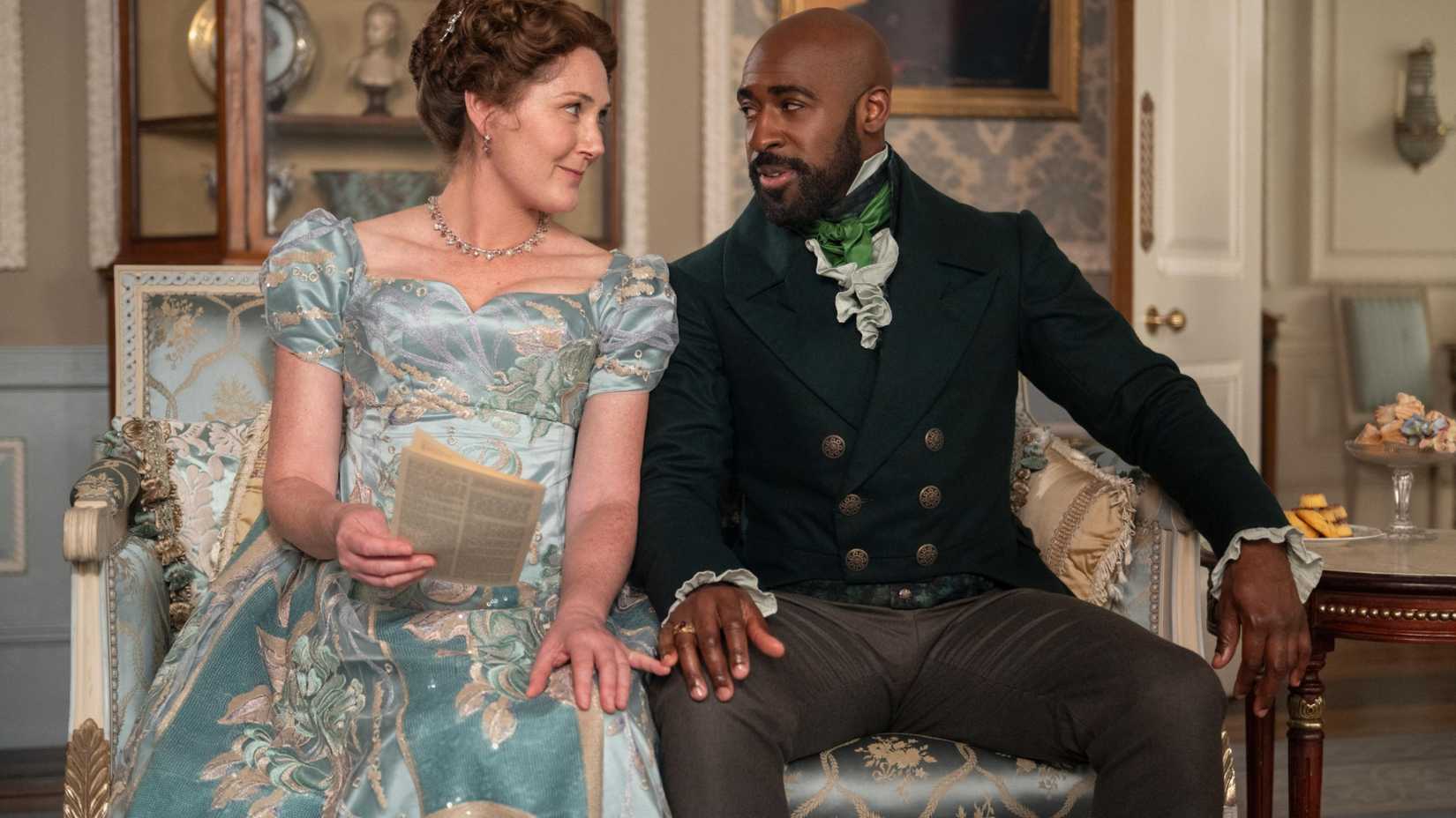 Lady Violet and Lord Marcus Anderson touching pinkies in Bridgerton season 4