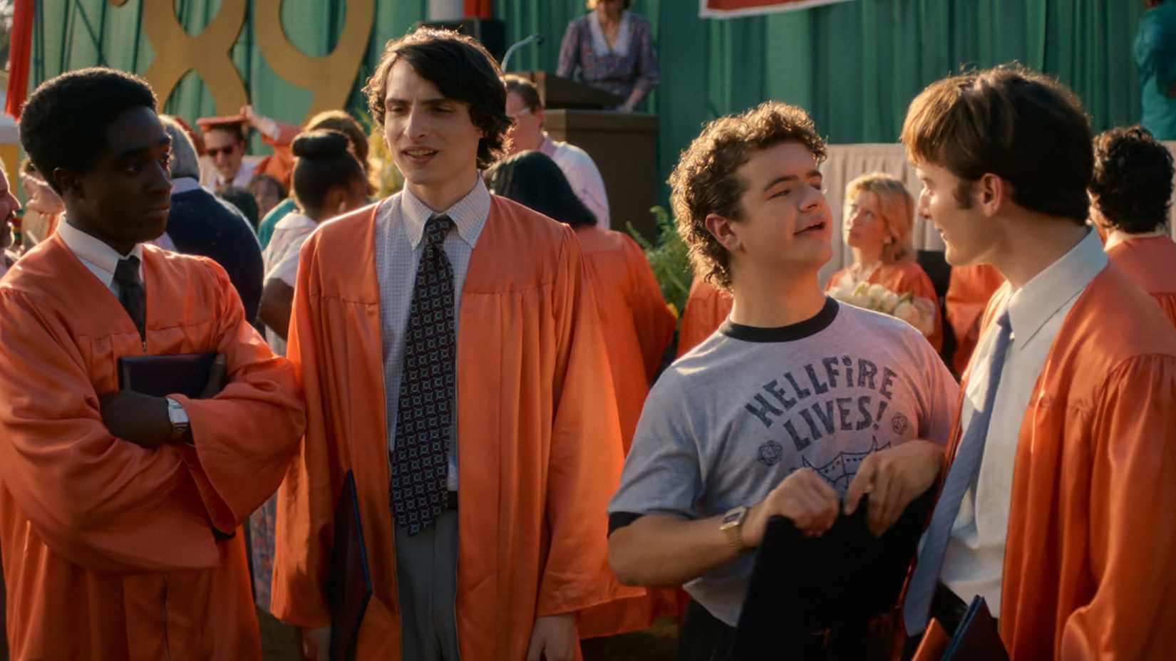 Lucas, Mike, Dustin and Will at graduation in Stranger Things epilogue
