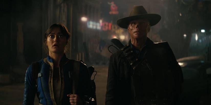 Lucy and The Ghoul looking terrified while encountering a Deathclaw in Fallout season 2