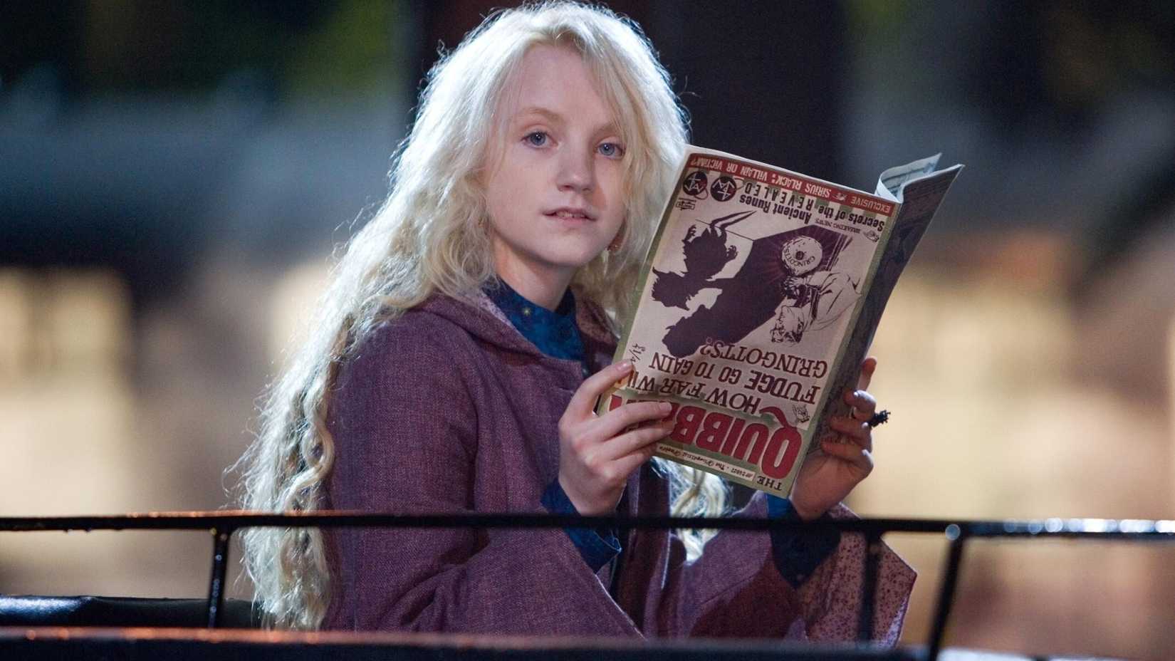 Luna Lovegood reading in Harry Potter