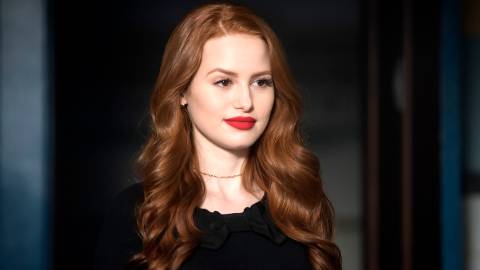 Madelaine Petsch's Cheryl smiling curiously in Riverdale