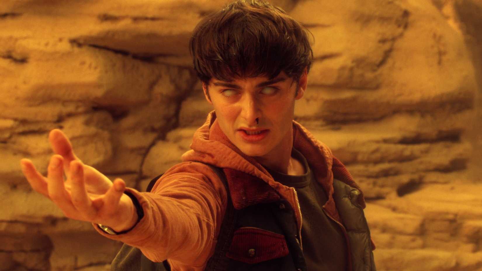 Noah Schnapp as Will Byers fighting Vecna in the final battle.