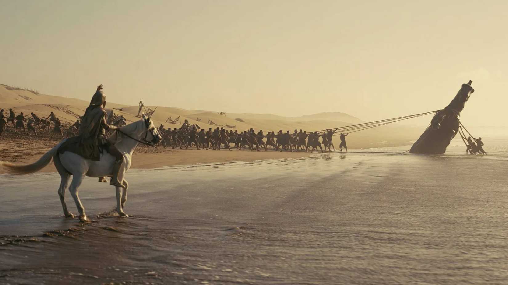 Puxando o Cavalo de Troia do mar em The Odyssey.