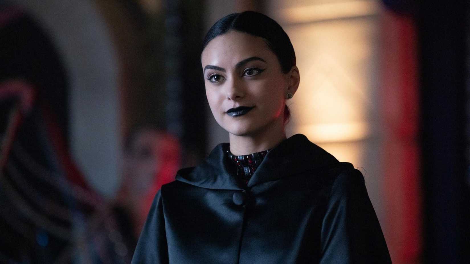 Veronica smiles while wearing dark lipstick in Riverdale
