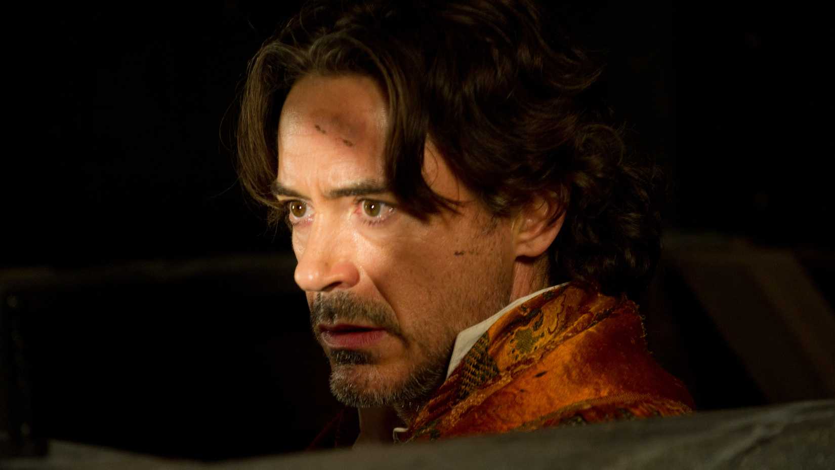 The Perfect Prime Video Replacement For RDJ's Sherlock Holmes 3 1 Robert Downey Jr as Sherlock Holmes hiding in the shadows in Guy Ritchie's Sherlock Holmes A Game of Shadows