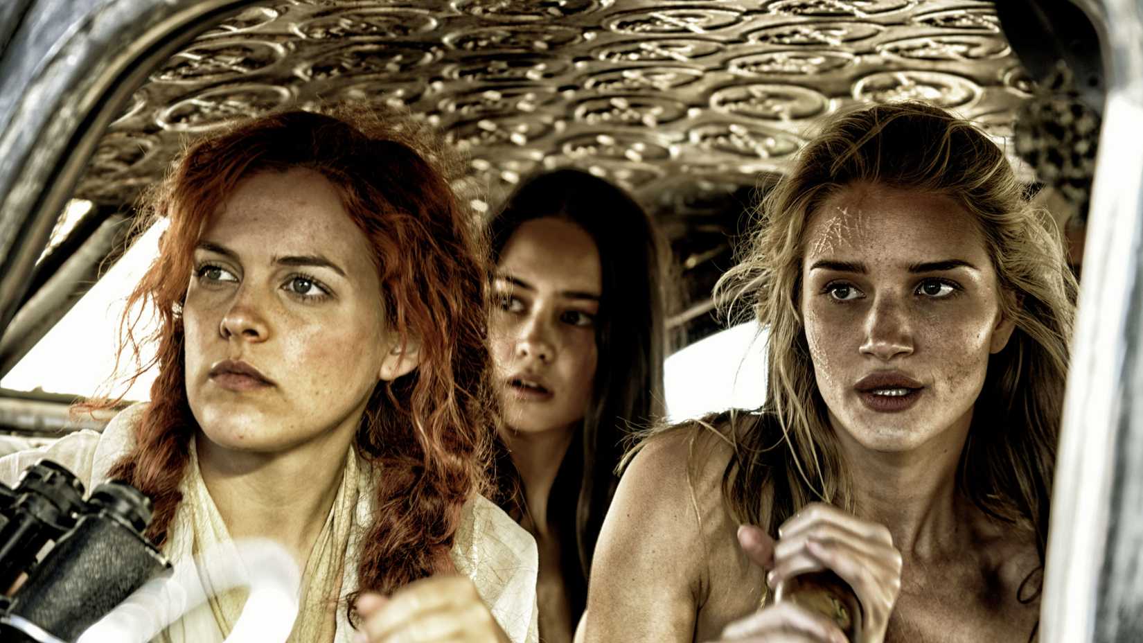 Rosie Huntington-Whitely, Riley Keough, and Courtney Eaton in Mad Max Fury Road
