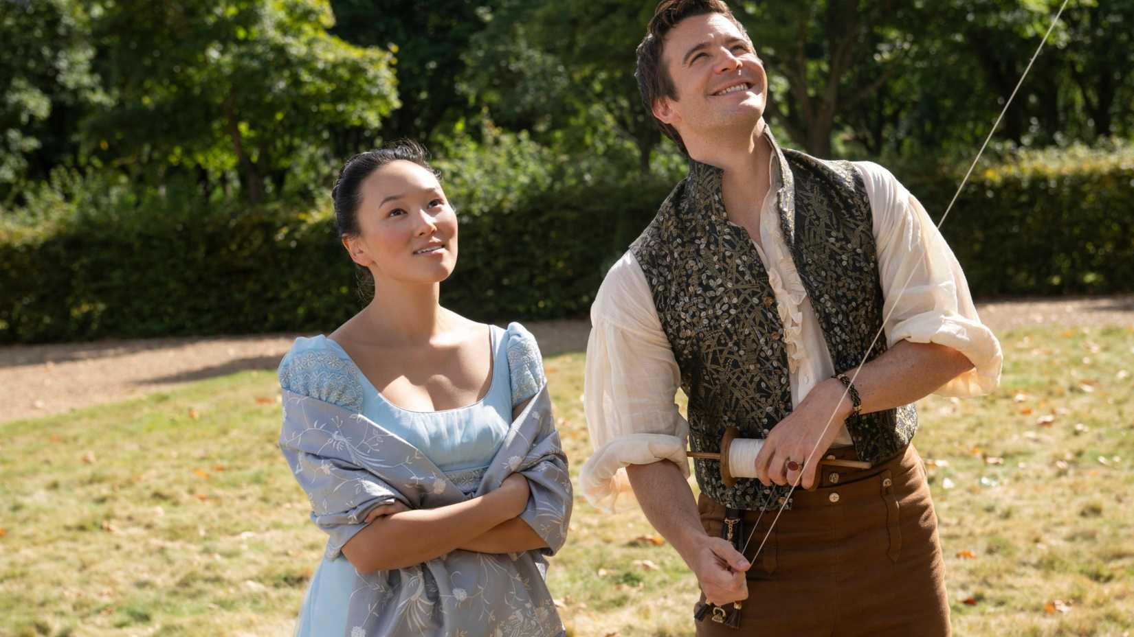 Sophie Baek (Yerin Ha) and Benedict Bridgerton (Luke Thompson) flying a kite in Bridgerton season 4