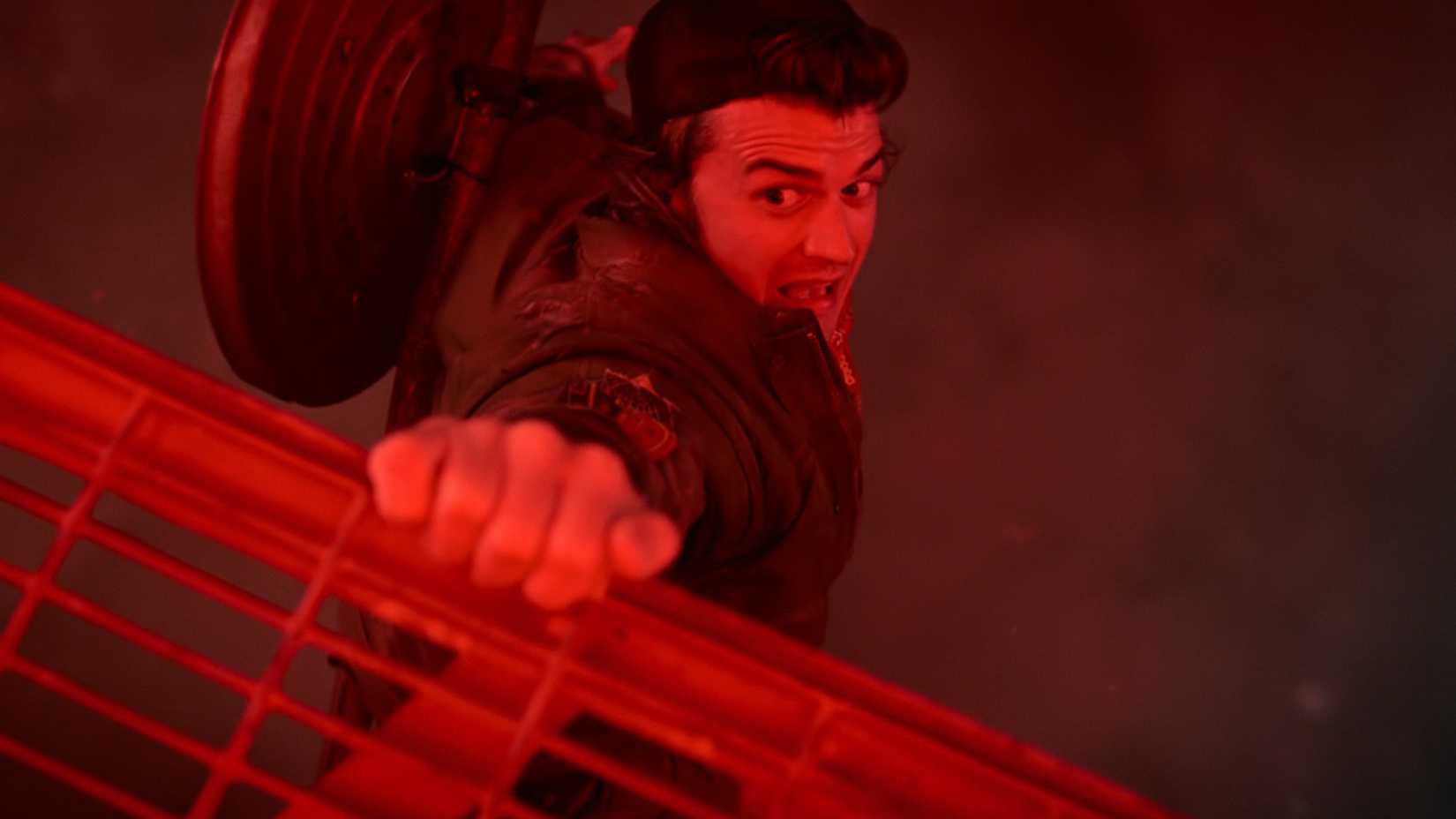 Steve hanging off radio tower in Stranger Things 5 Finale
