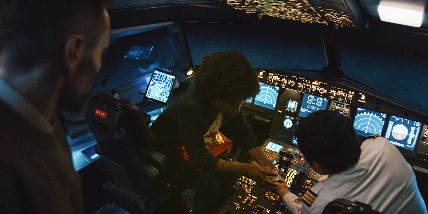 People working on a plane in Into the Night.