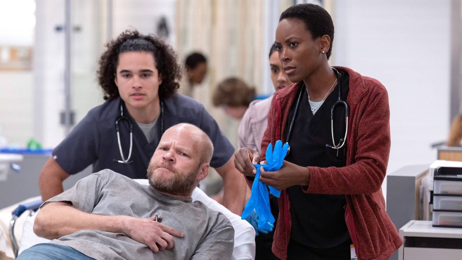 Dr. Heather Collins (Tracy Ifeachor) with a nurse and a patient in The Pitt season 1, episode 3