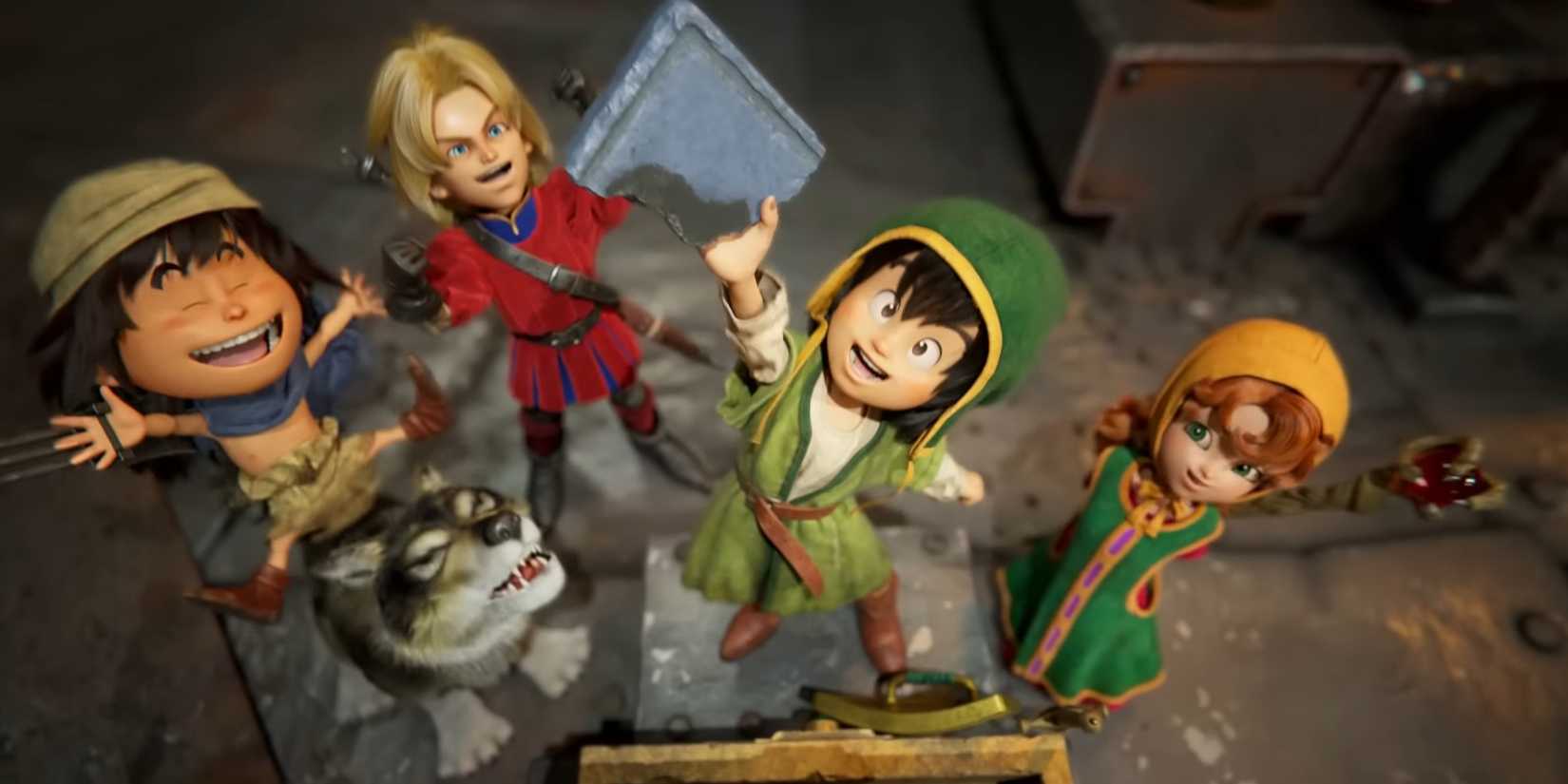 The cast of Dragon Quest 7 Reimagined standing in front of a treasure chest. The Hero holds a broken piece of stone tablet in the air while the others celebrate.