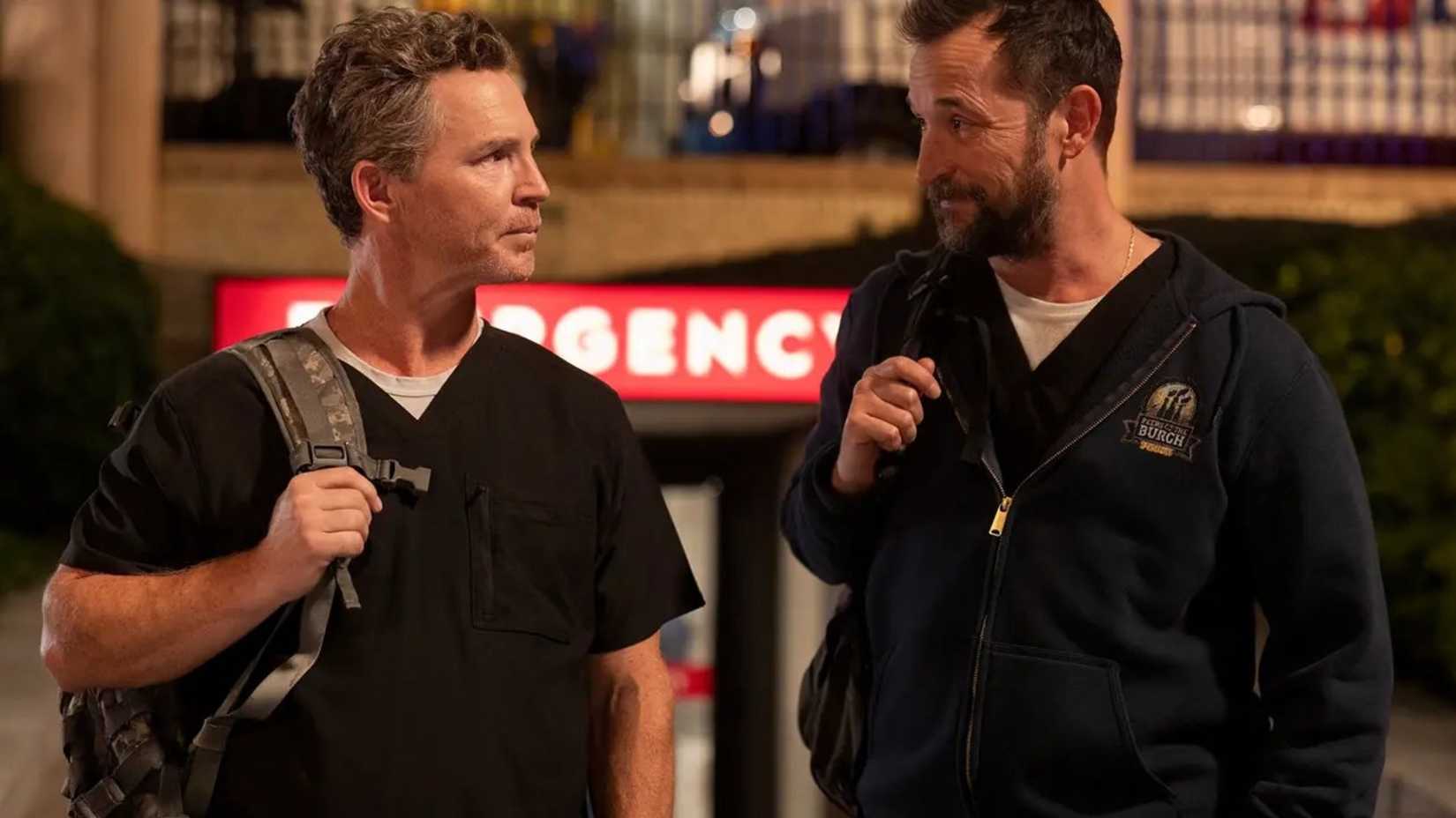 Jack Abbot (Shawn Hatosy) talking to Michael "Robby" Robinavitch (Noah Wyle) in The Pitt season 1.