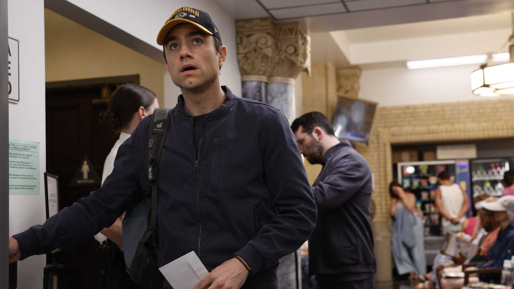 Dr. Langdon (Patrick Ball) in street clothes in The Pitt season 2, episode 1