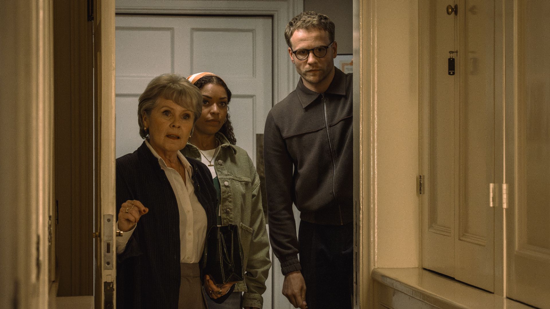 Aunt Ada (Imelda Staunton), Antonia Thomas (Tuppence) and Josh Dylan (Tommy) opening a door in Tommy & Tuppence