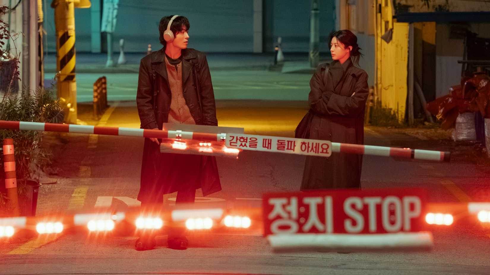 12 Upcoming K-Dramas You Cannot Miss 3 Two people at a railroad crossing in the K-drama We Are All Trying Here.