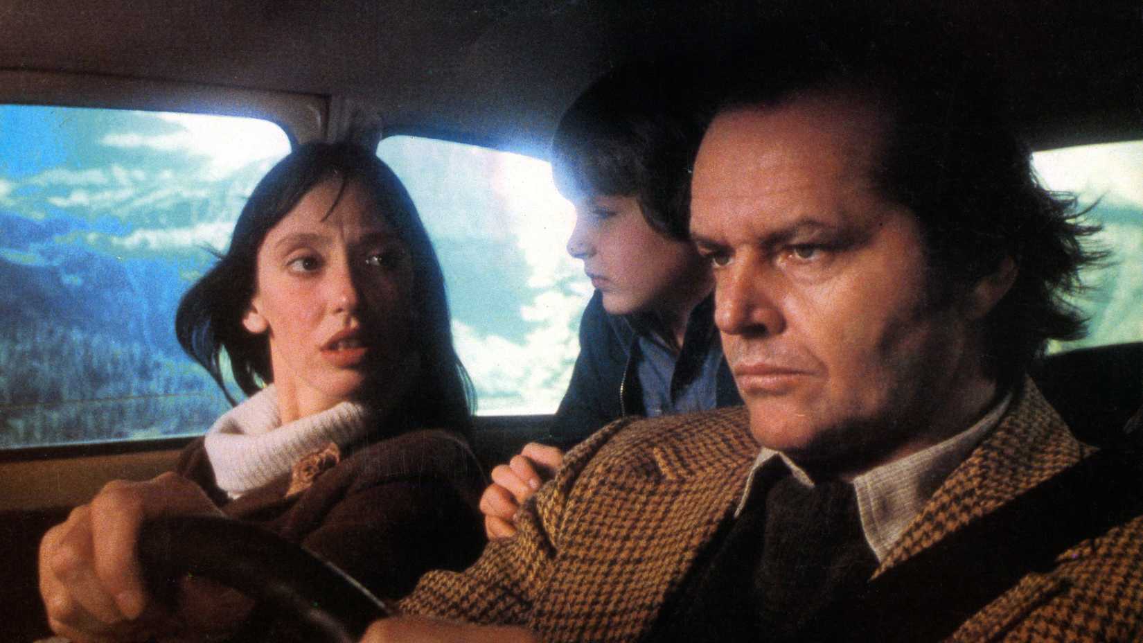 Wendy Danny and Jack in the car at the beginning of The Shining