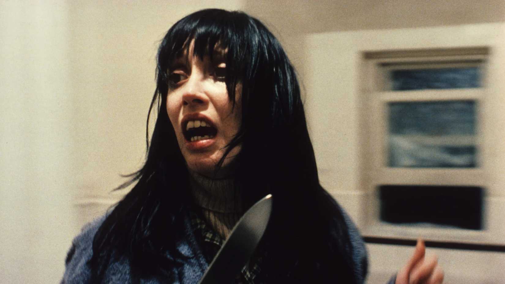 Wendy scared holding a knife in The Shining