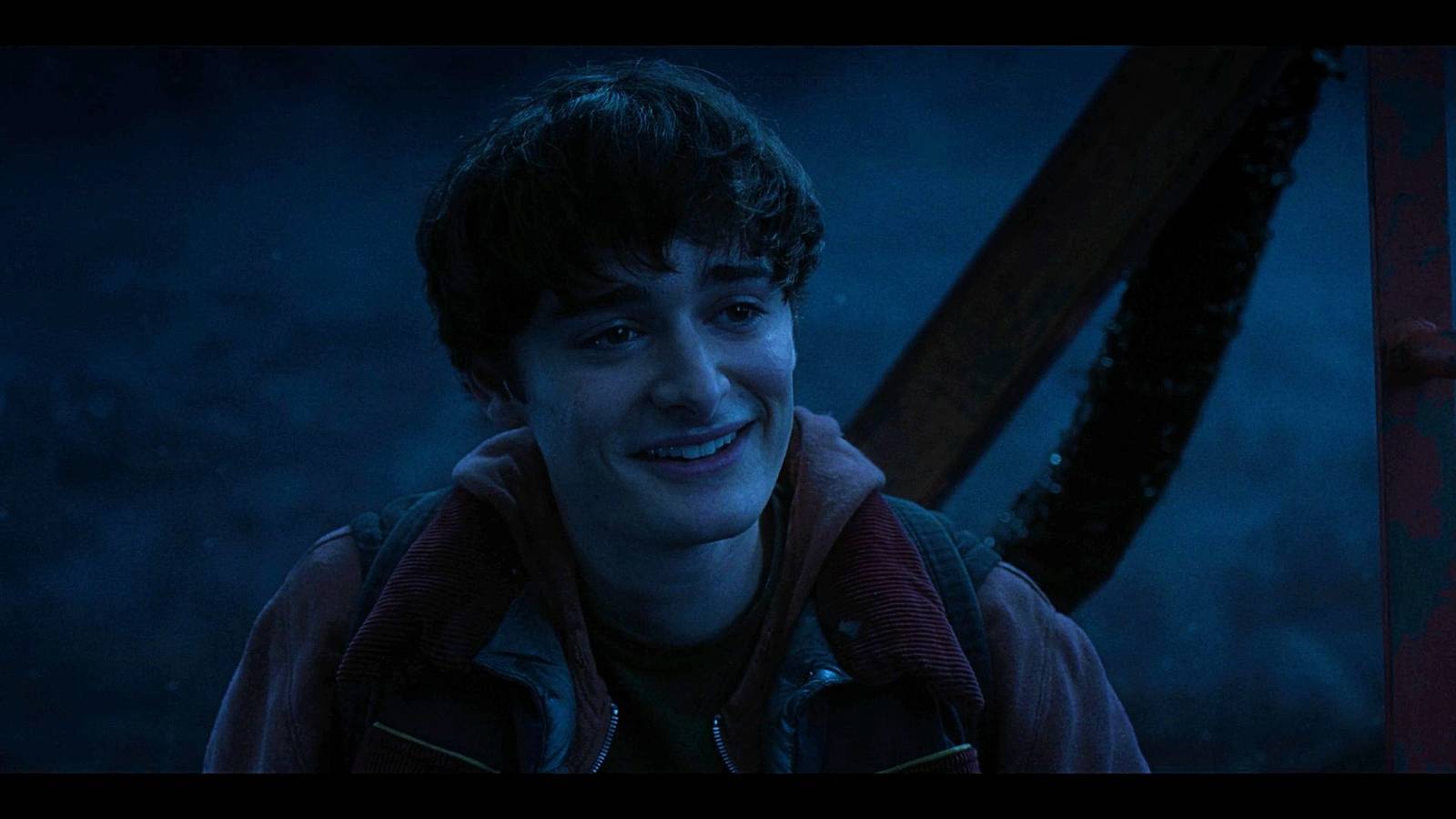 Will Byers (Noah Schnapp) smiling in the Stranger Things series finale