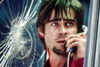 A bloodied Colin Farrell holds a phone in Phone Booth