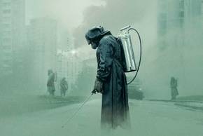 A cleaning team walks through the city in Chernobyl series poster