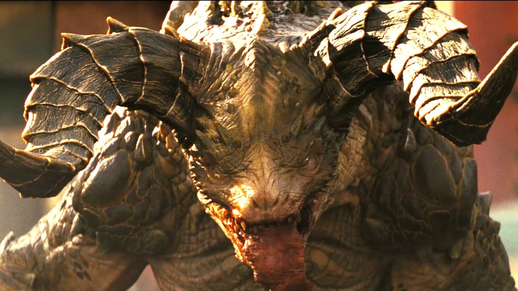 A Deathclaw looking menacingly toward the camera with meat in its mouth in Fallout season 2