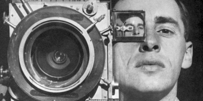 A man's face next to a camera in Man With a Movie Camera