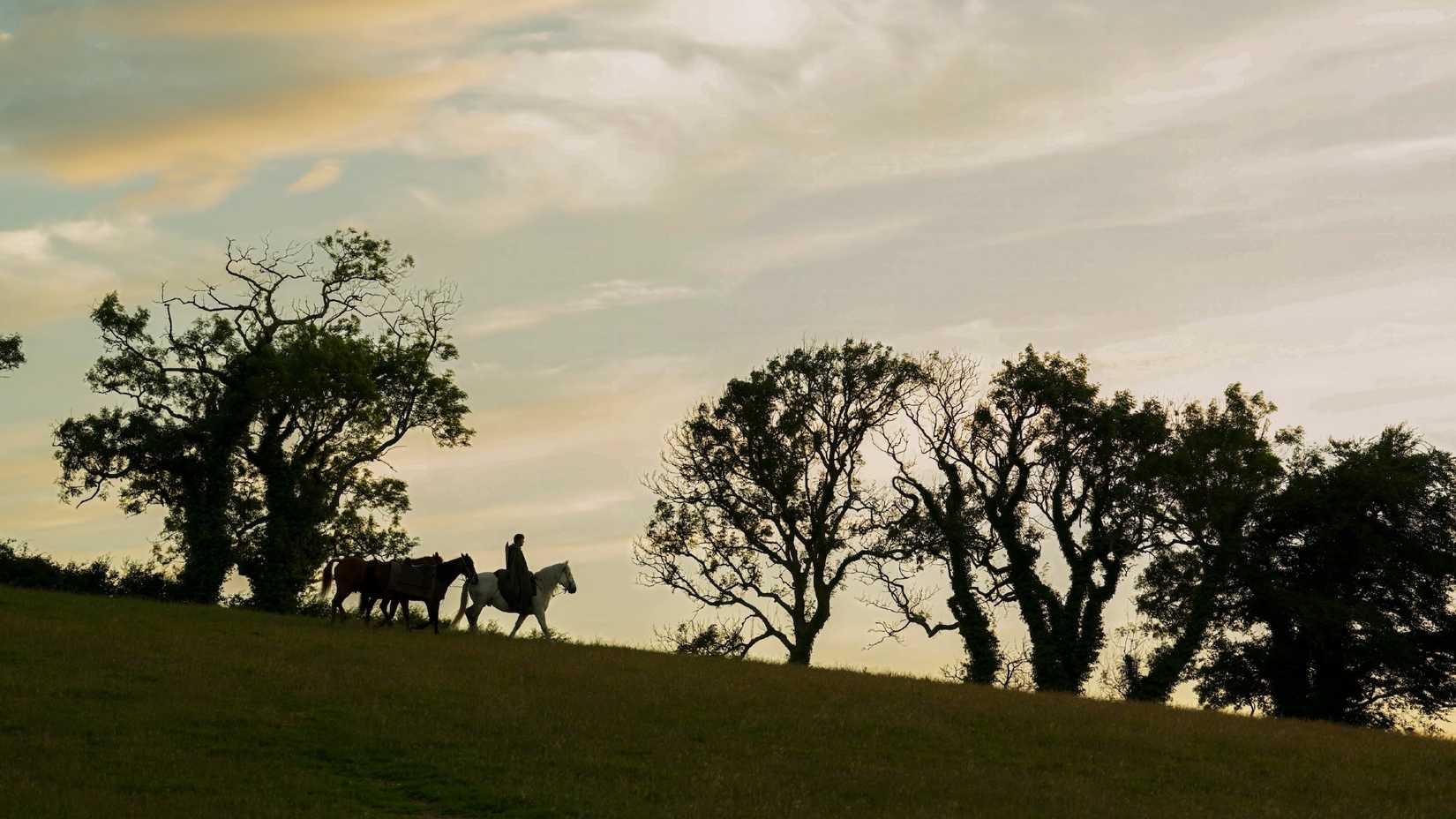 a sunset landscape in a knight of the seven kingdoms