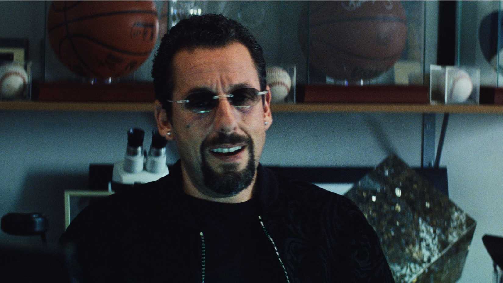 Adam Sandler como Howard Ratner em Joias Brutas
