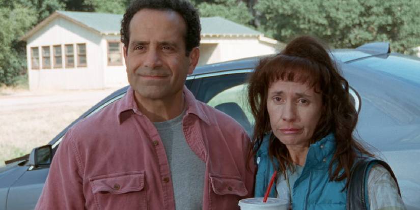 Adrian standing next to Laurie Metcalf as Cora in Monk