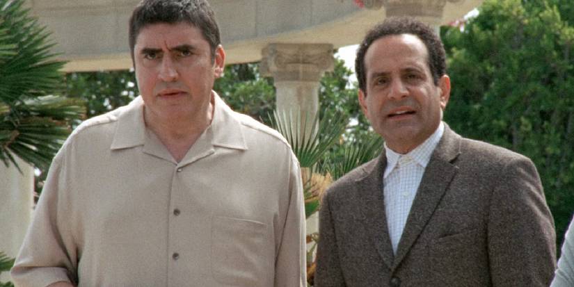 Alfred Molina looking grumpy with Adrian in Monk