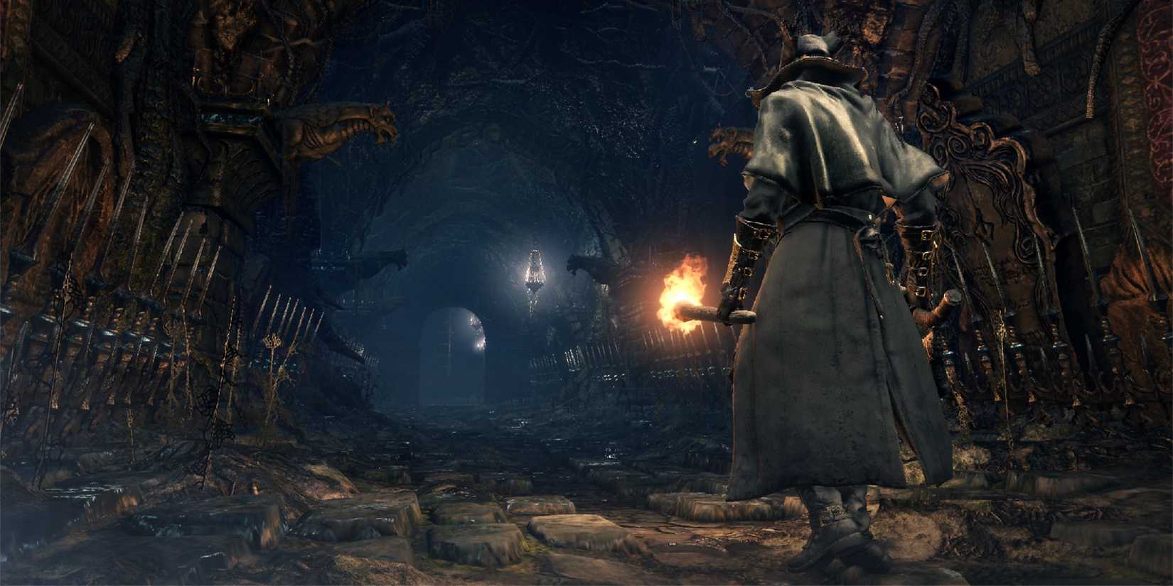 The Hunter looking down a long hall in Bloodborne