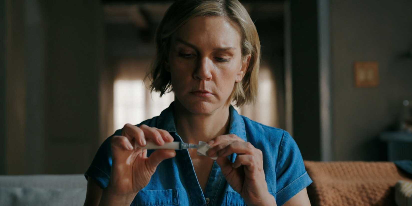 carol holding a syringe of truth serum in pluribus