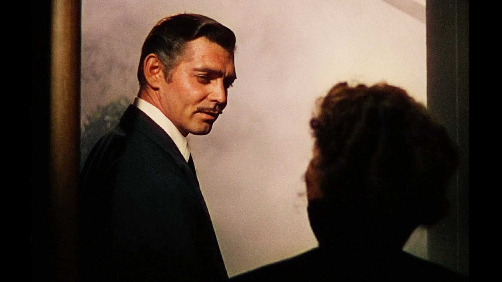 Кларк Гейбл в роли Ретт Батлер говорит Вивьен Ли в роли Скарлет О'Хара: "Frankly, My Dear, I Don't Give A Damn" в фильме "Gone With the Wind"